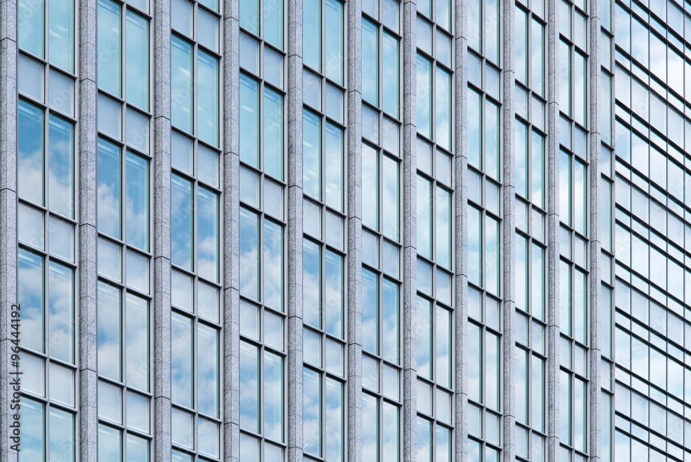 Exterior Glass Windows of a Modern Office Building Exterior Glass Windows of a Modern Office Building
