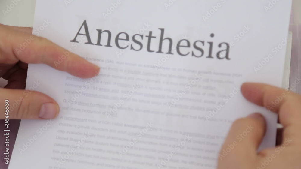 Doctor Holding Anesthesia lawsuit papers