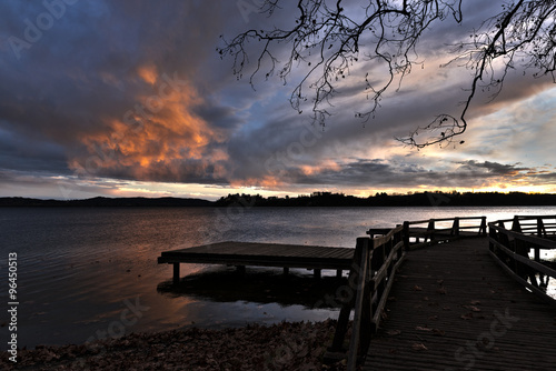 Sunset on the Varese lake with cloudy sky over the lake
