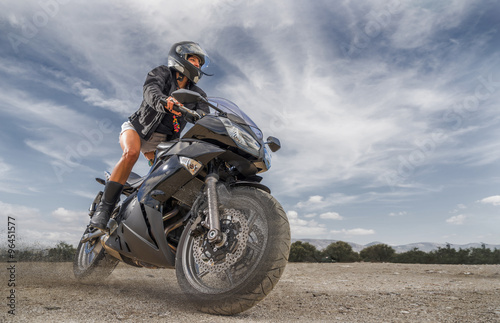 Fototapeta Naklejka Na Ścianę i Meble -  Sexy motorbike female rider