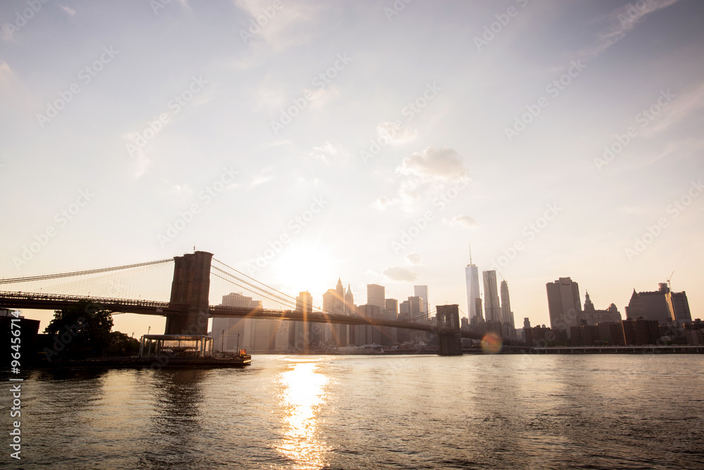 sunset on brooklyn bridge view from brooklyn, new-york city