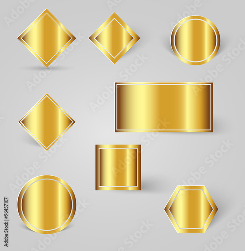 collection of shiny gold badges with shadows