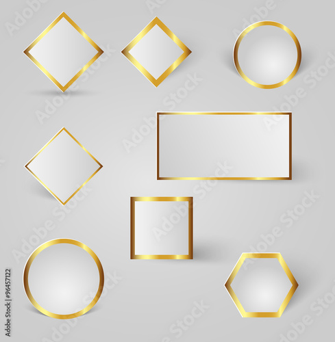 collection of shiny gold badges with shadows