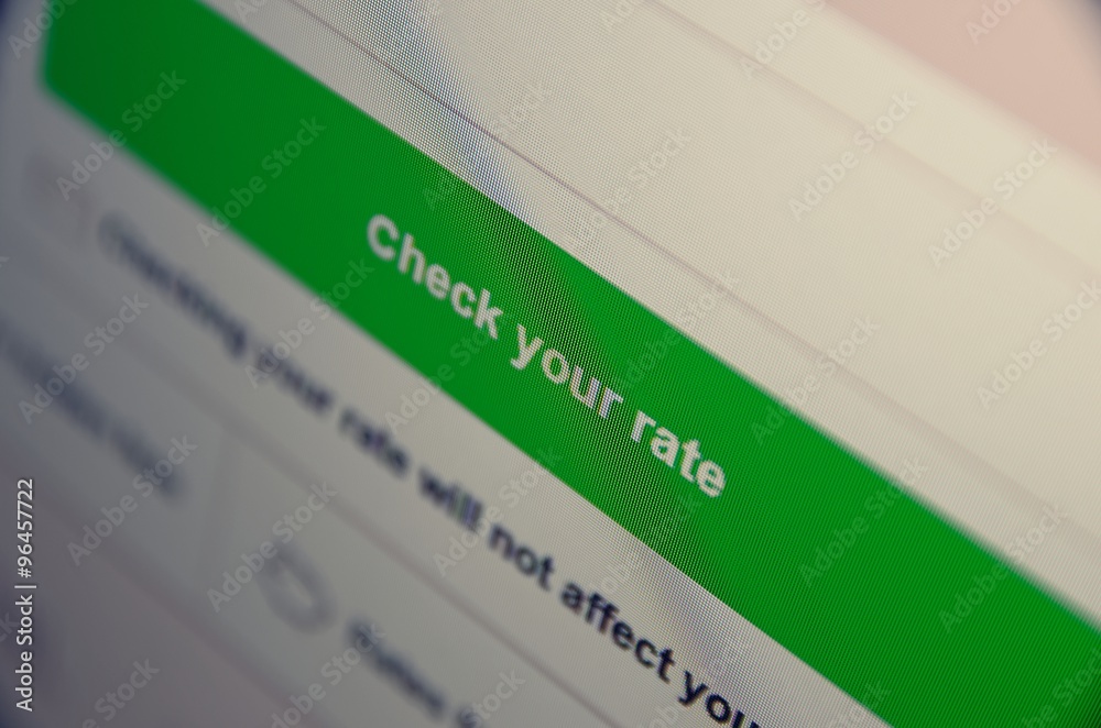 Text check your rate on the button. Selective focus. Text check your rate on the button. Selective focus.