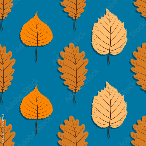 Pattern with autumn leaves on dark blue background.