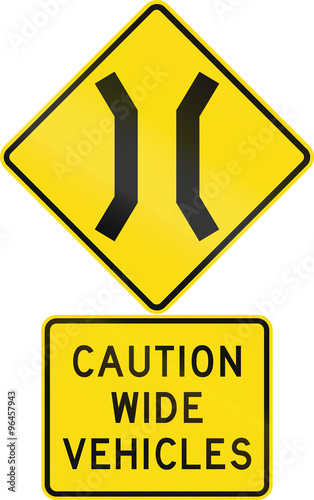Road sign assembly in New Zealand - Caution wide vehicles