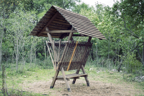 wooden forest feeder photo