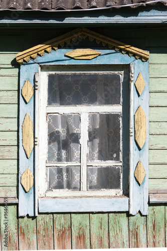 Carved window in old National russian wooden  house