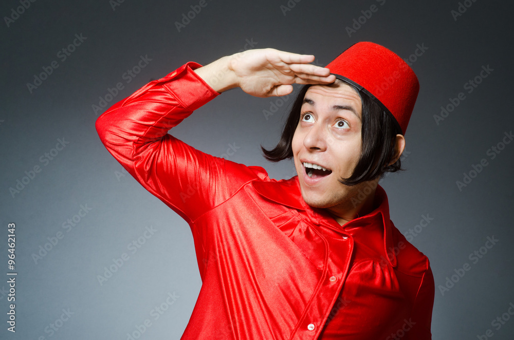 Man wearing red fez hat Man wearing red fez hat