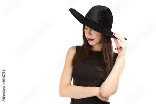 Young brunette woman in black dress on a white background © 5second