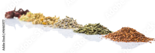 Fototapeta Naklejka Na Ścianę i Meble -  Dried herbal tea leaves, lavender, rooibos, chamomile, linden flower, hibiscus, Japanese green tea over white background