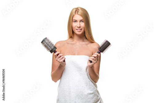 Young attractive woman hair and blue eyes in towel