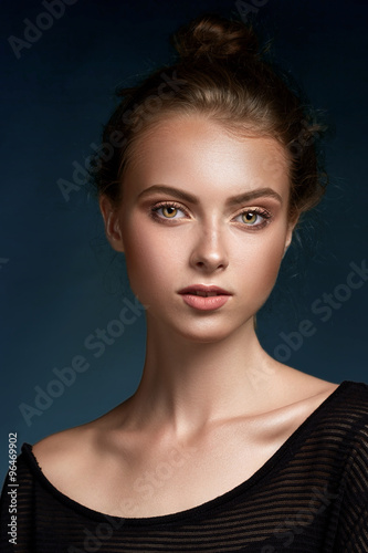 Beauty woman face closeup isolated on black background. Beautifu