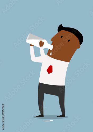 Businessman drinking milk from bottle