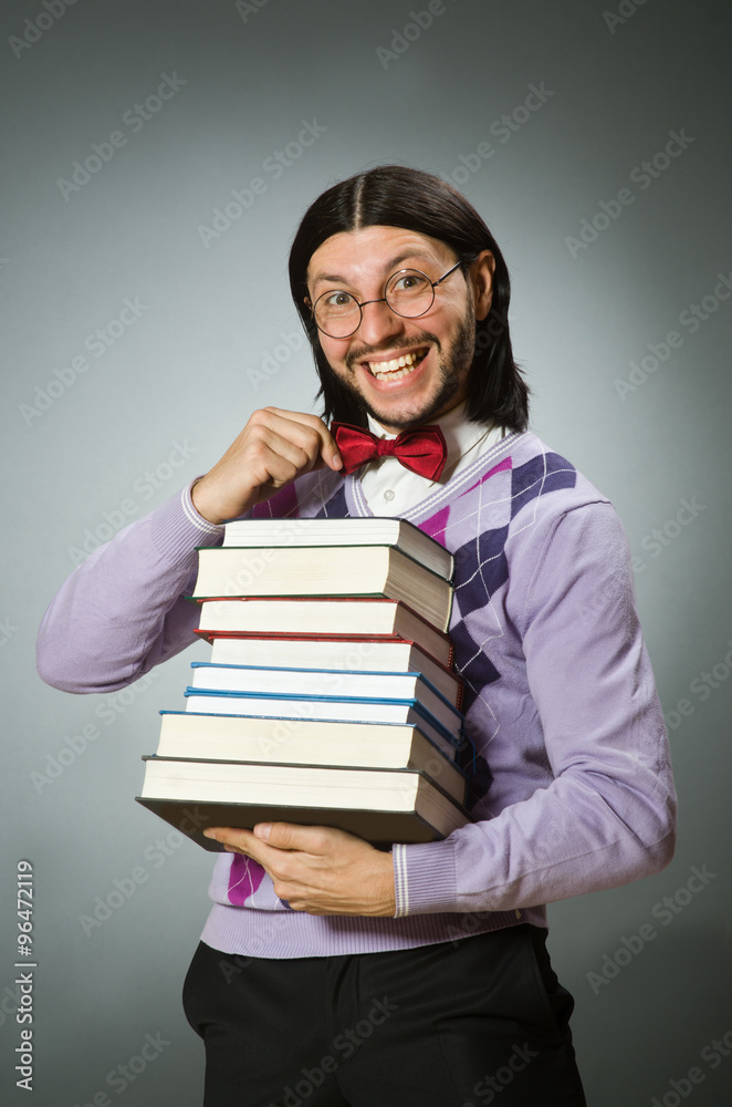 Young student with book in learning concept Young student with book in learning concept