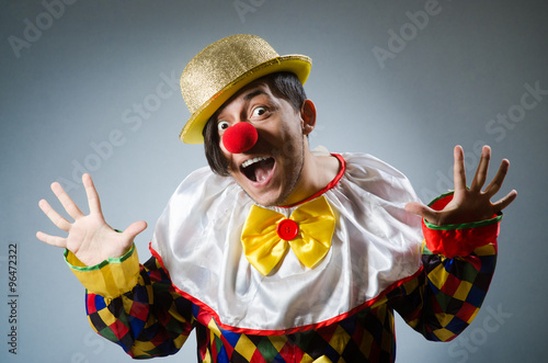 Obraz na plátne Funny clown against dark background
