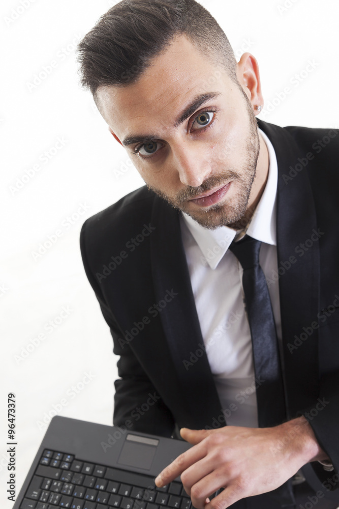 Portrait of young businessman with laptop isolated on white back Portrait of young businessman with laptop isolated on white back