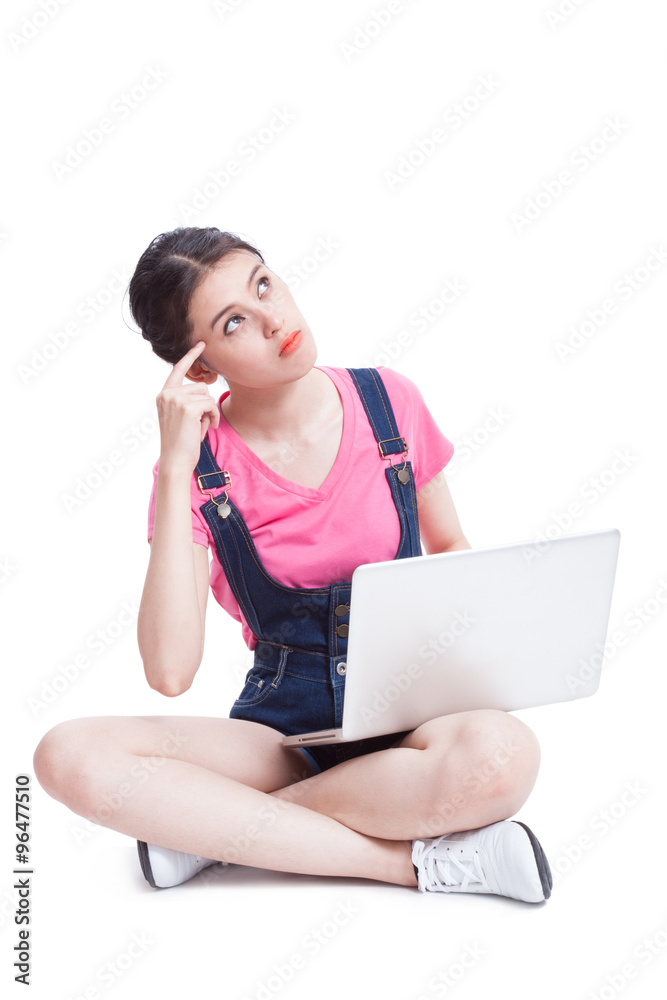Happy young woman using a computer with thinking. Happy young woman using a computer with thinking.
