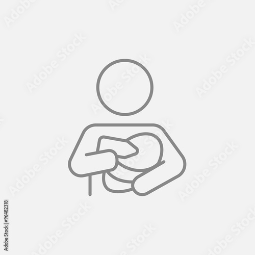 Woman nursing baby line icon.