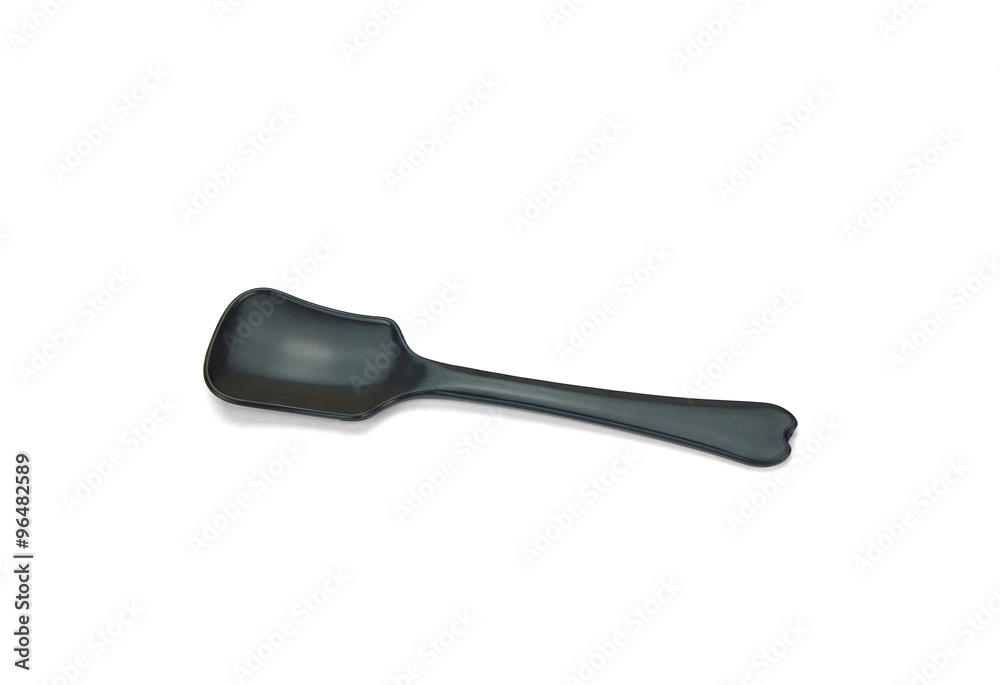 Small plastic ice cream spoon isolated on white Small plastic ice cream spoon isolated on white