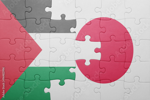 puzzle with the national flag of japan and palestine