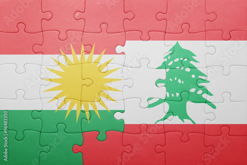 puzzle with the national flag of lebanon and kurdistan photo