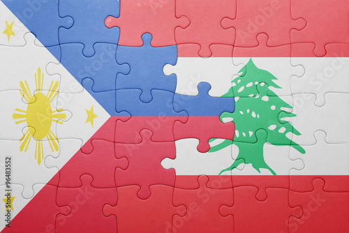 puzzle with the national flag of lebanon and philippines photo