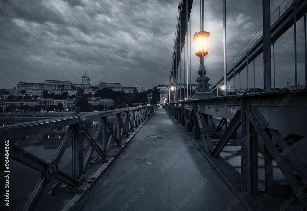 Old bridge at rainy night