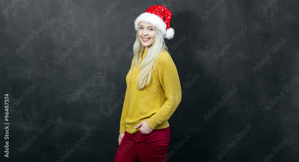 laughing Santagirl in front of a chalkboard - Santagirl with emp