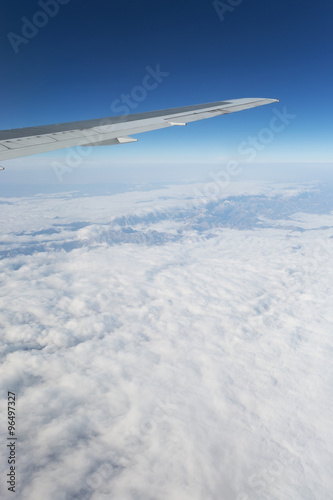  Above the clouds.Wing aircraft in the sky under earth of Tibeth.
