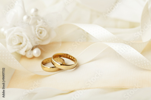 wedding rings and wedding invitation