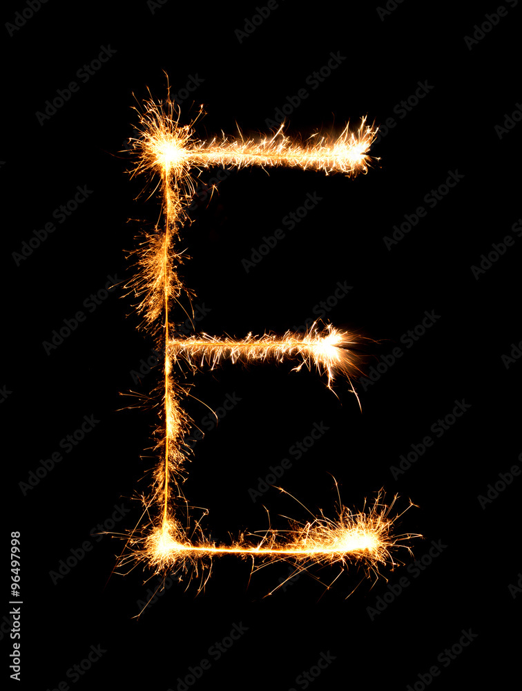 Sparkler firework light alphabet E (Capital Letters) at night Sparkler firework light alphabet E (Capital Letters) at night