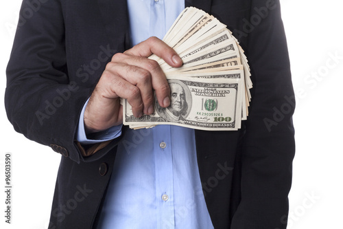 Man in Suit Showing Dollars