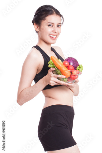 Healthy eating, happy young woman with vegetables on white background © japhoto