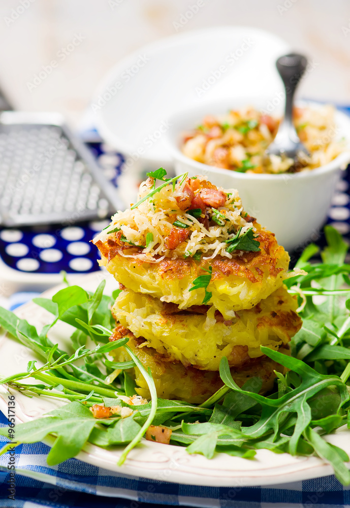 potato fritters with a green salad