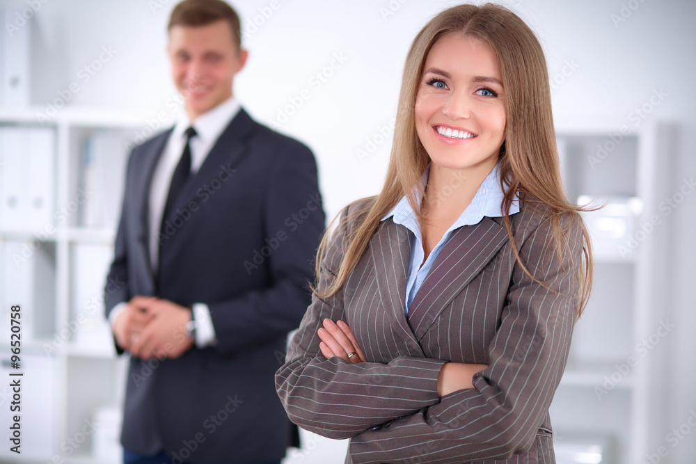 Face of beautiful business woman on the background of business people Face of beautiful business woman on the background of business people