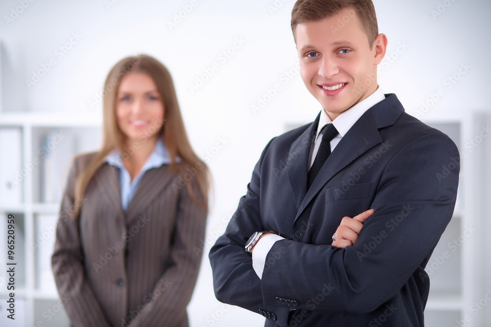 Face of beautiful businessman on the background of business people Face of beautiful businessman on the background of business people