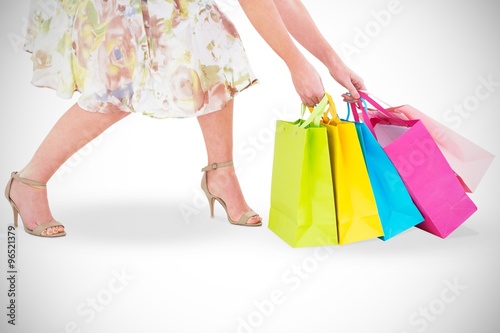Elegant woman holding shopping bags