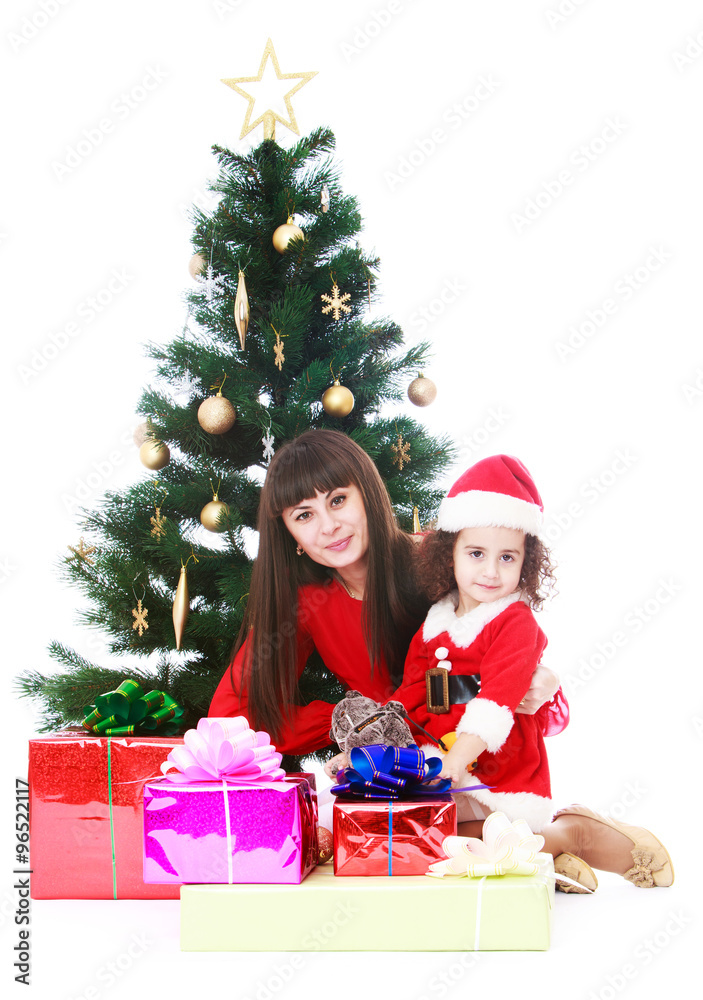 Mom and daughter at Christmas tree Mom and daughter at Christmas tree