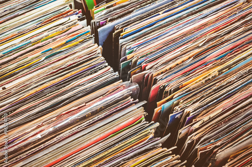 Retro styled image of boxes with vinyl turntable records photo