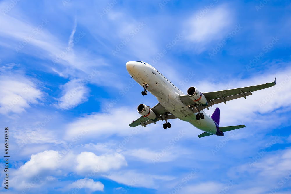 Landing plane in clouds