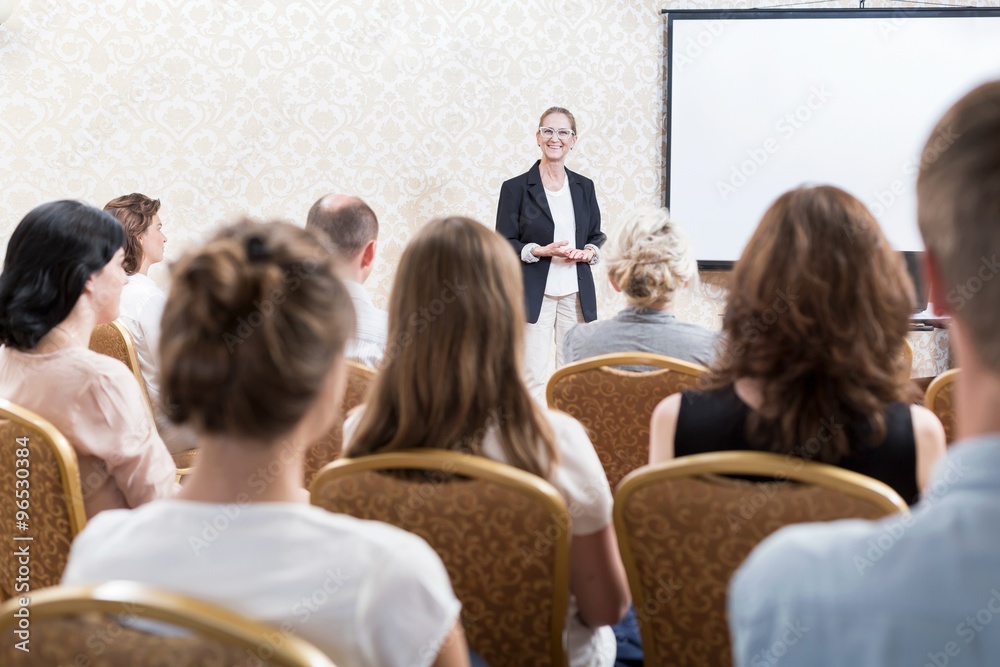 Obraz premium Speaking at the conference