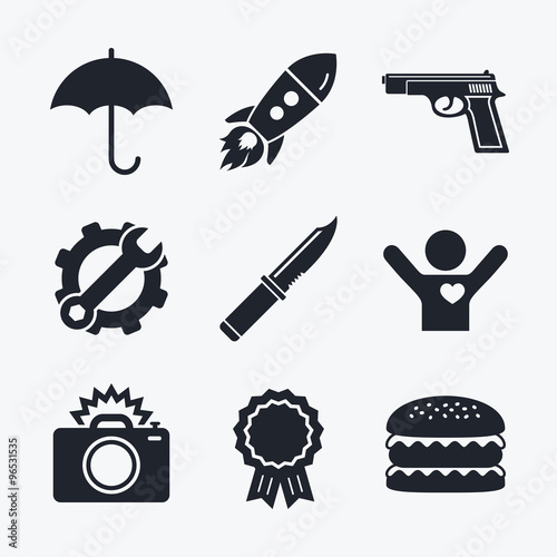 Gun weapon. Knife, umbrella and photo camera.