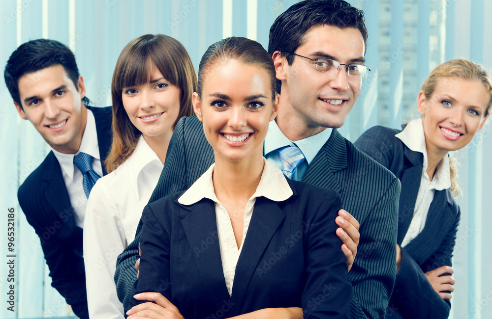Portrait of happy successful business team at office