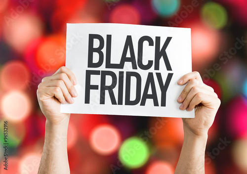 Black Friday placard with red lights on background