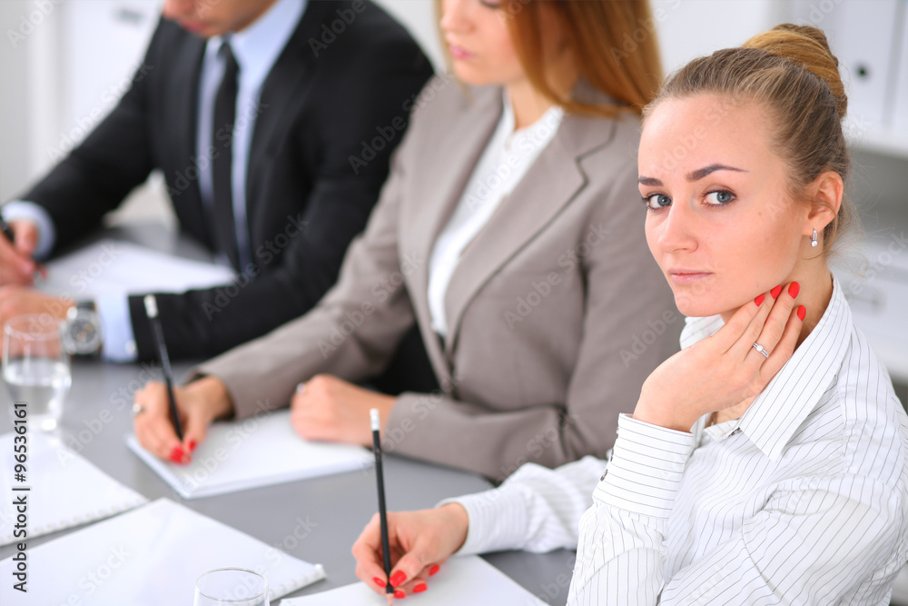Group of business people working together in office Group of business people working together in office