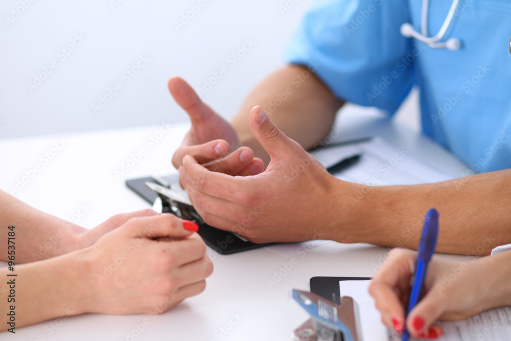 Doctor and patient are discussing something Doctor and patient are discussing something