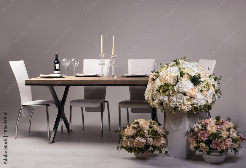 Wooden table setting and decoration for meal time, studio shot