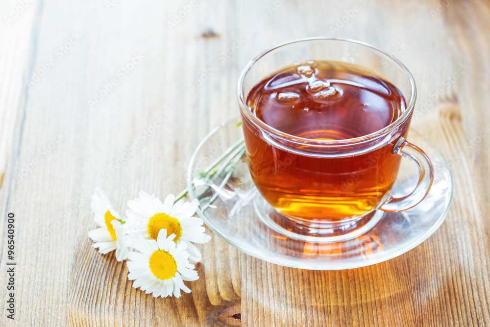 Cup of tea with chamomile