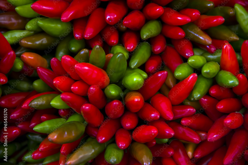 Bunch of red hot chili pepper peperonchino on a market stall